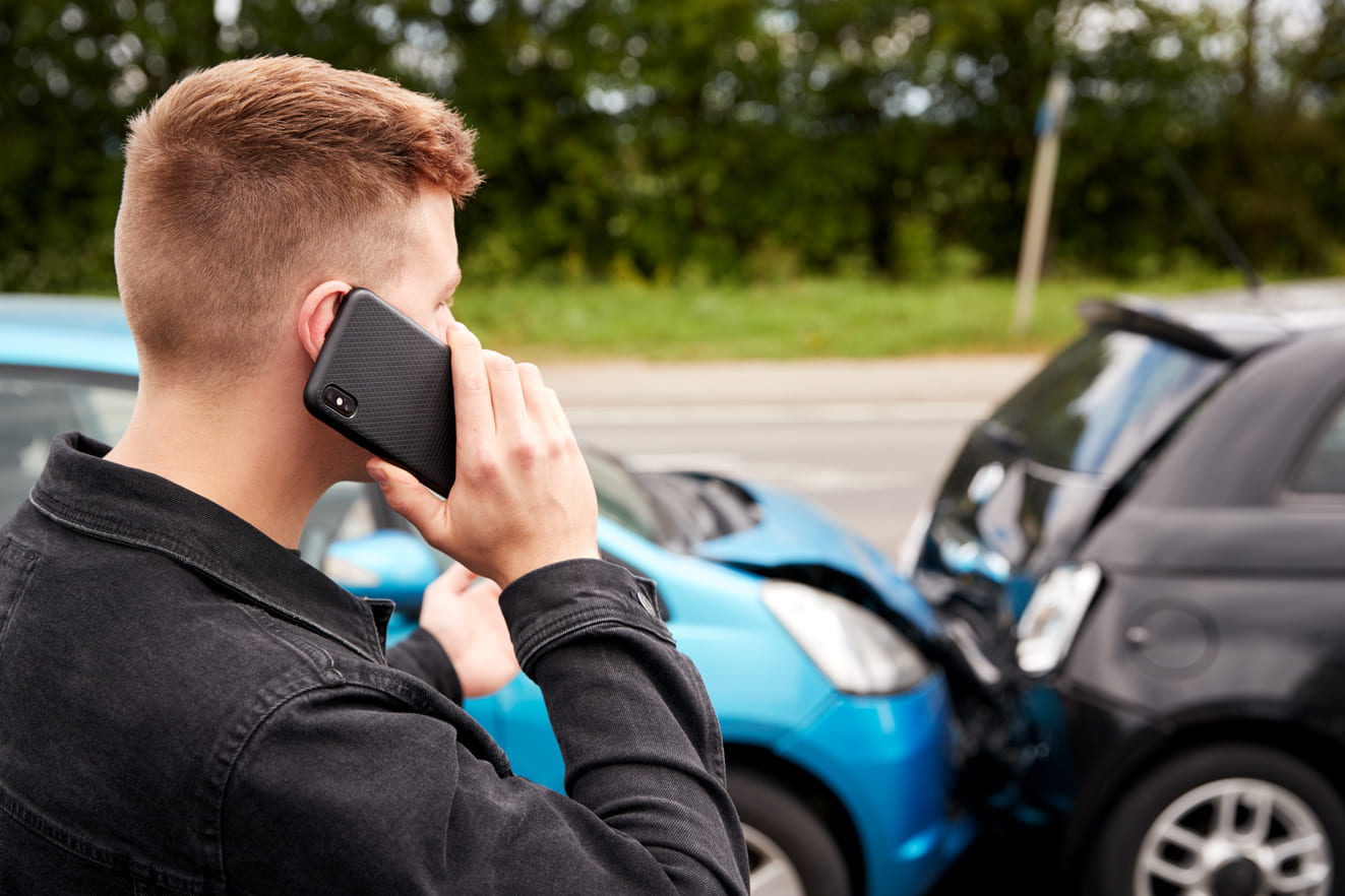 driver of leased car calling lawyer after car accident