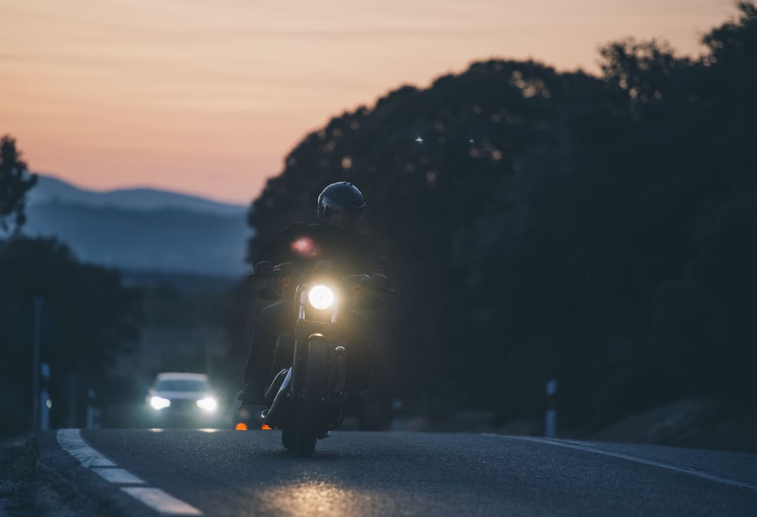 motorcyclist on texas road at night