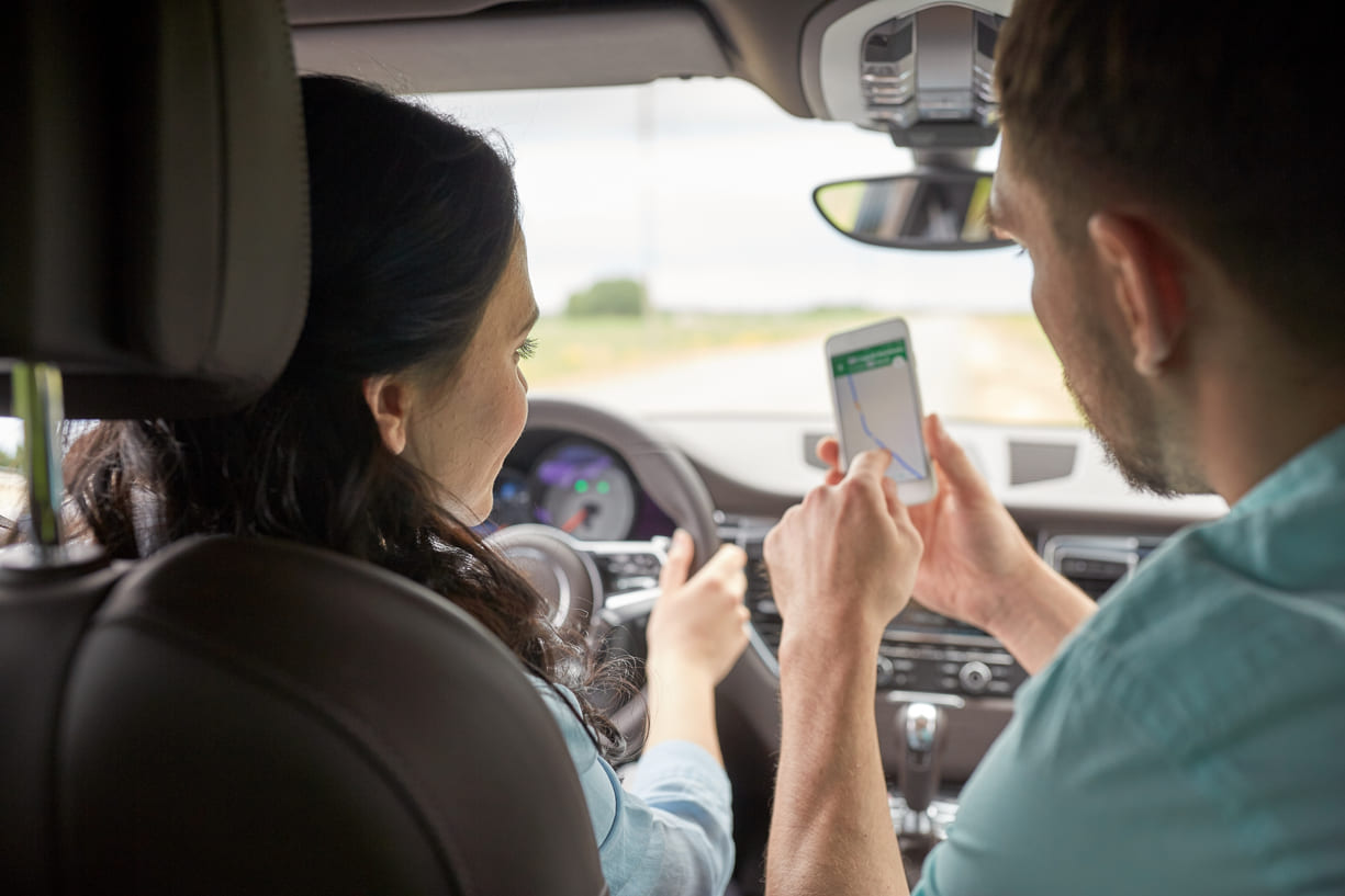 texas drivers looking at phone in car