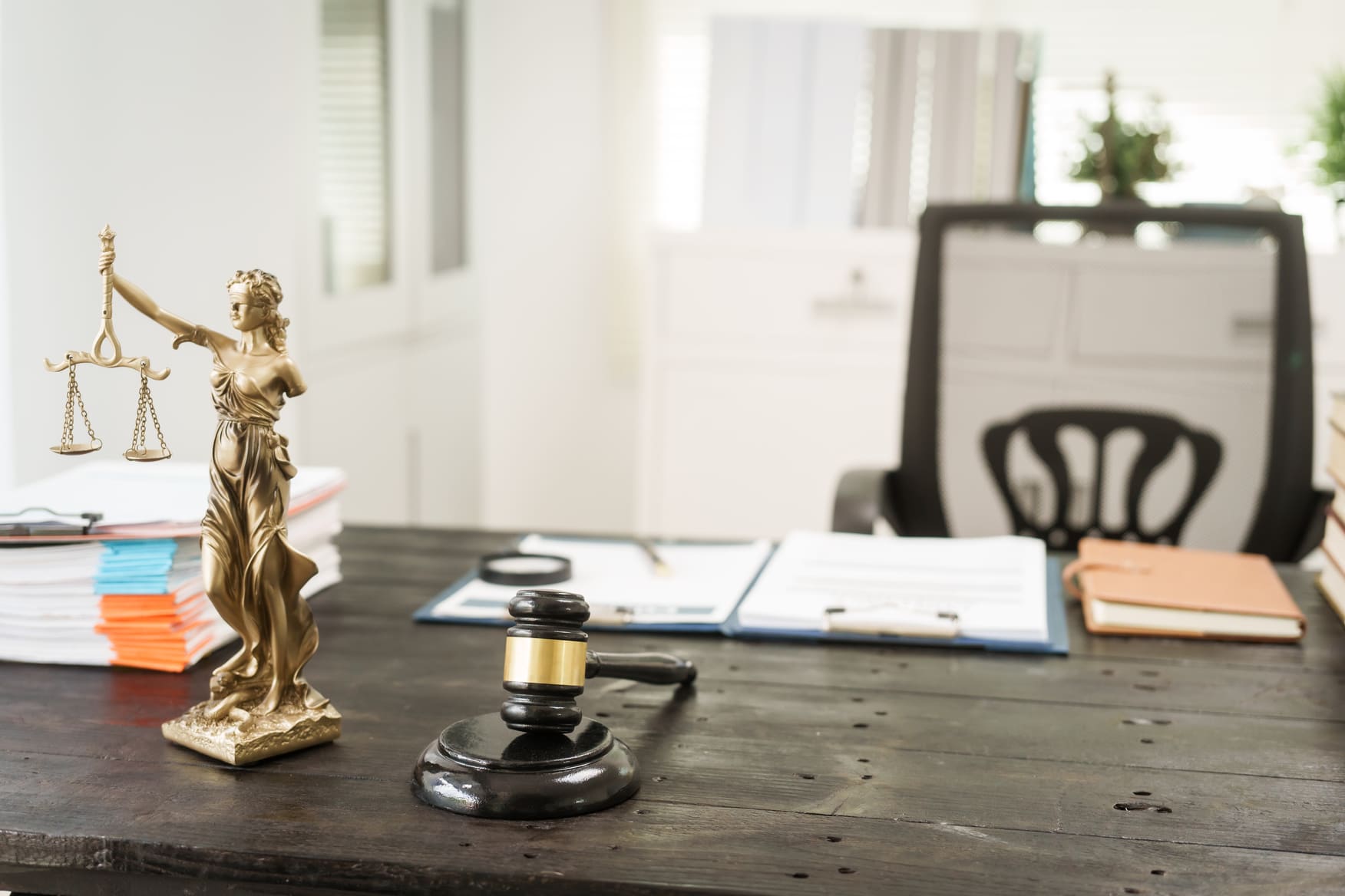 lawyer desk with paperwork