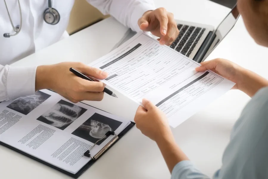Doctor giving a patient their health report